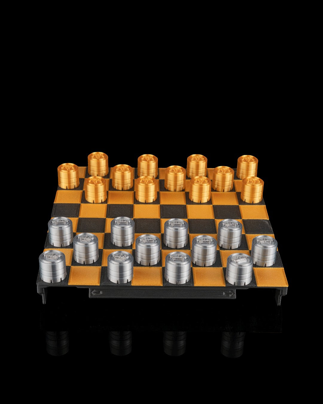 MJR Crafted fold-up checkers set with gold and silver 3D printed pieces on a black and gold board.