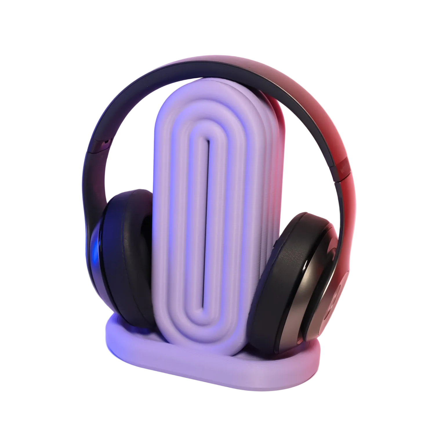 Headphones on a stand with a gradient background