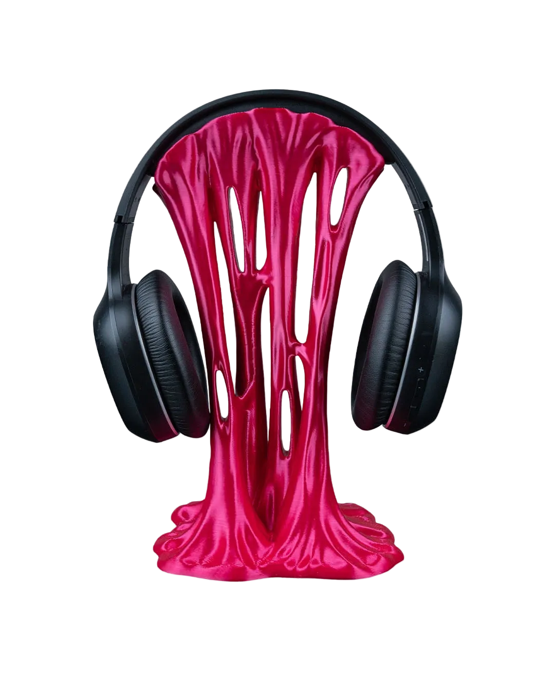 Pink slushy-shaped headphone stand with black headphones on a white background