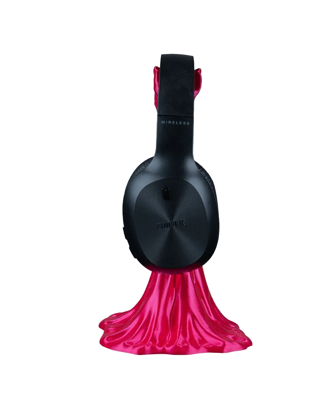 Black headphones with a pink fabric-like base on a white background