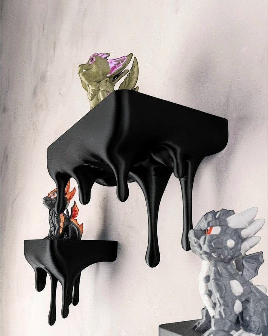 MJR Crafted blue 3D printed melting shelf with a unique dripping design, holding dragon figurines.