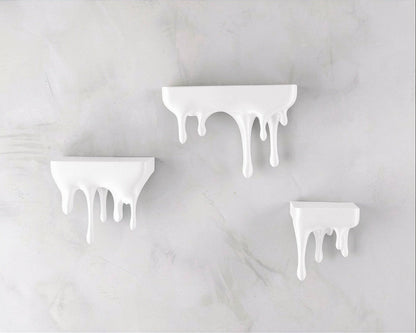 MJR Crafted blue 3D printed melting shelf with a unique dripping design, perfect for wall decor.