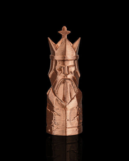 MJR Crafted copper-colored 3D printed king chess piece with crown and beard detail on black background.
