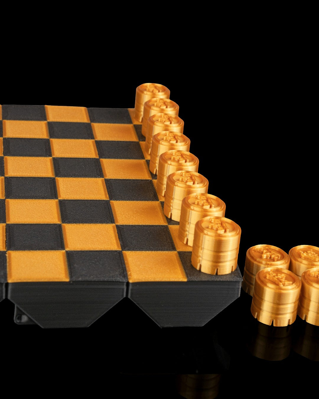 MJR Crafted fold-up checkers set with gold and black 3D printed pieces and board, perfect for travel.