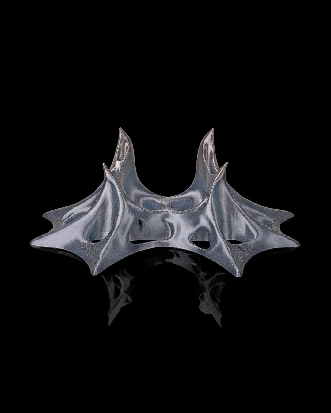 MJR Crafted modern sculptural gaming controller stand in silver PLA, designed for Xbox and PlayStation controllers.