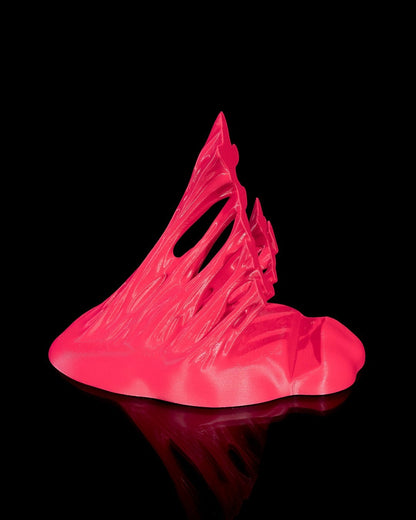 MJR Crafted bright pink 3D printed phone stand with a sculptural wave design and textured finish.