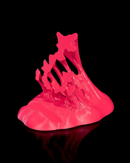 MJR Crafted pink 3D printed phone stand with sculptural wave design and textured finish.