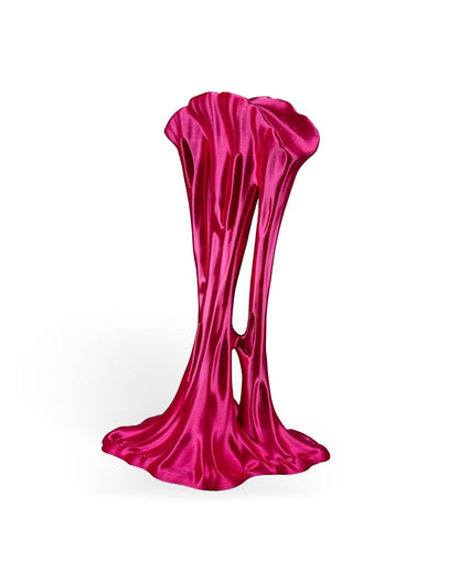 MJR Crafted pink metallic headphone stand with a dripping slime design.