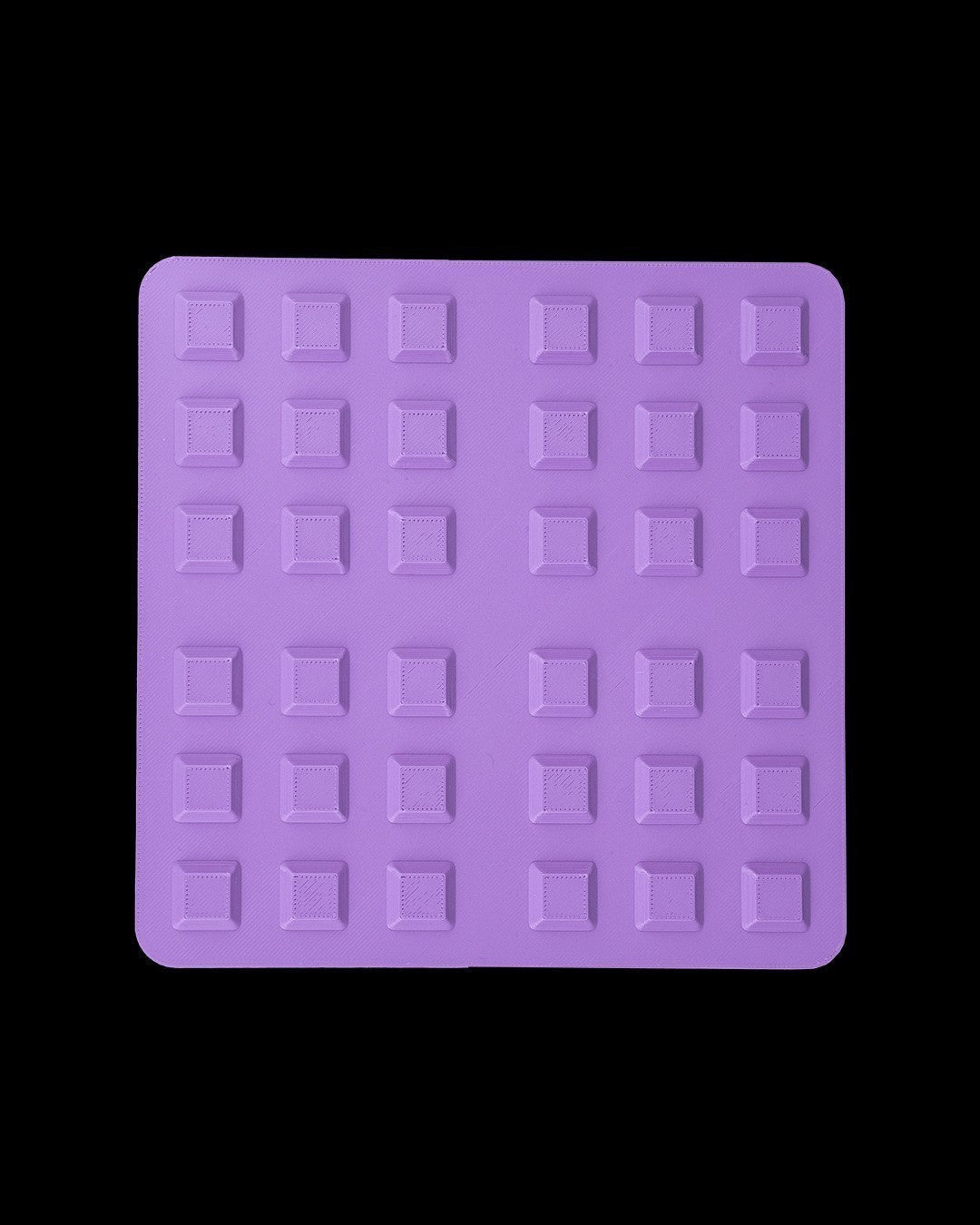 MJR Crafted purple modular desk organizer system base with a grid of square indentations for customization.