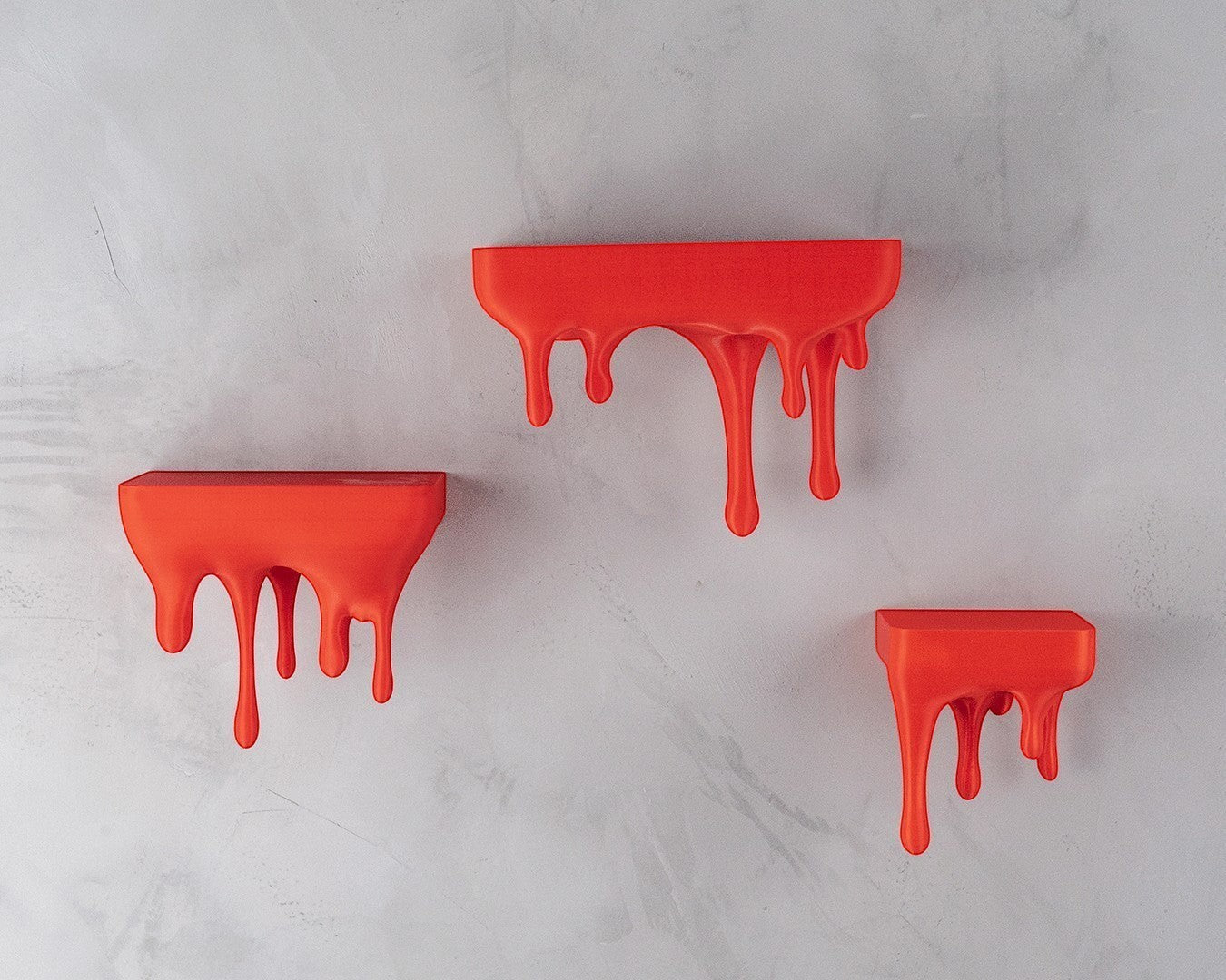 MJR Crafted red 3D printed melting wall shelves with a dripping effect. Set of three shelves.