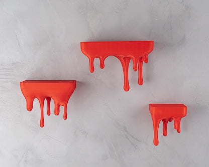 MJR Crafted red 3D printed melting wall shelves with a dripping effect. Set of three shelves.