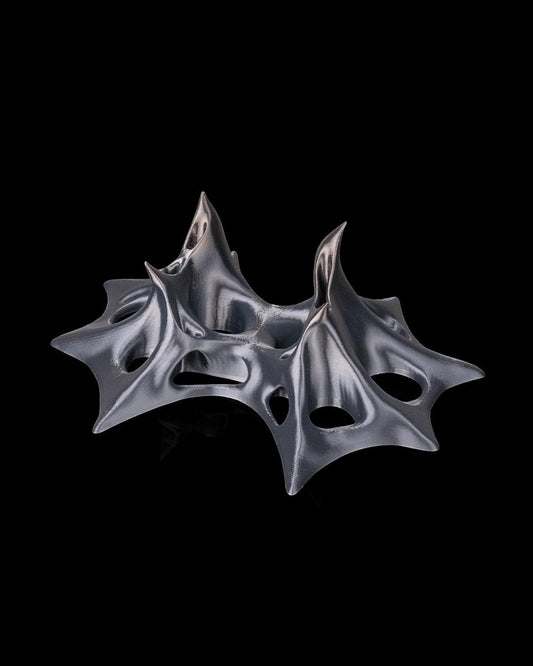MJR Crafted Modern silver PLA gaming controller stand with organic, sculptural design. Holds Xbox/PlayStation controllers.