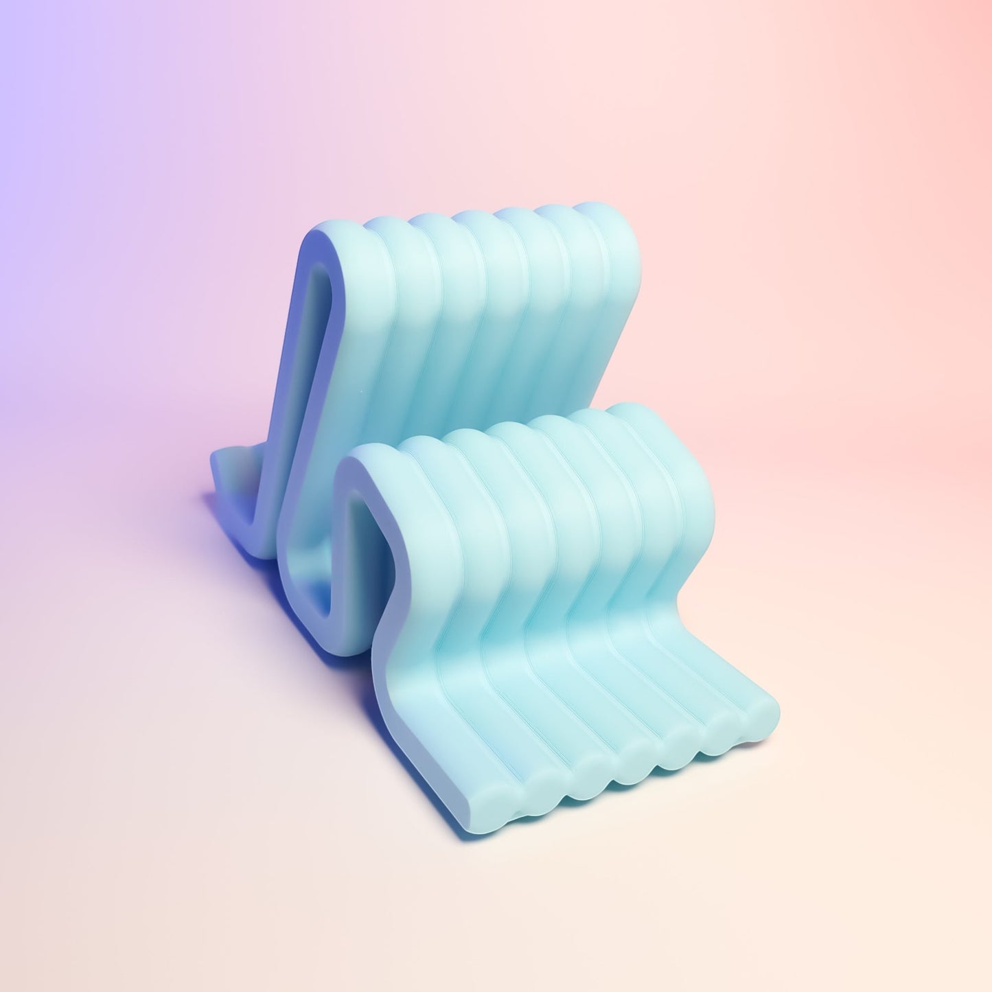 MJR Crafted light blue wavy phone stand with ribbed texture, perfect for desks and nightstands.