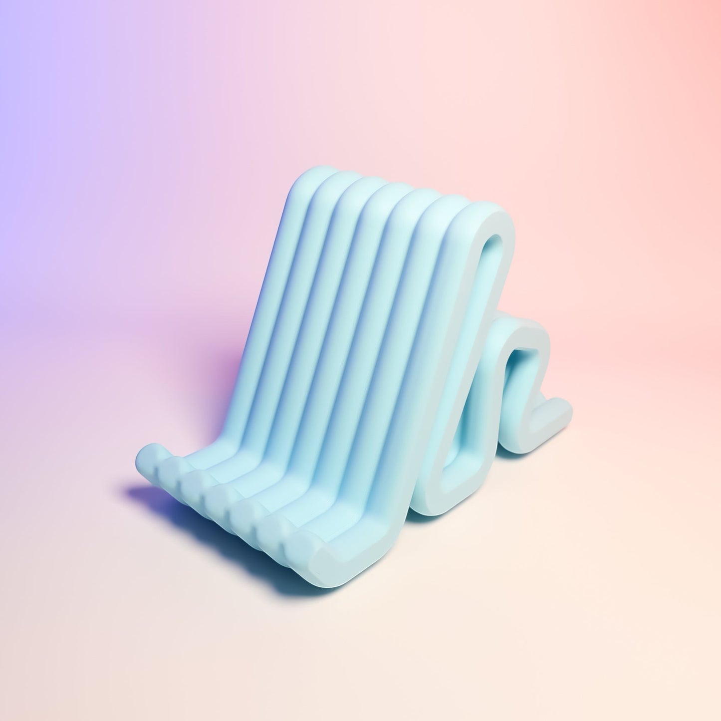 MJR Crafted light blue wavy phone stand made of flexible material, perfect for desks and nightstands.