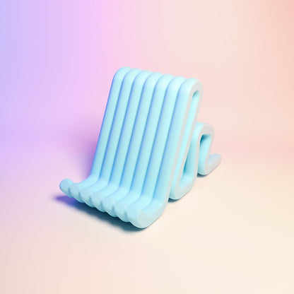 MJR Crafted light blue wavy phone stand, a playful and flexible desk accessory.