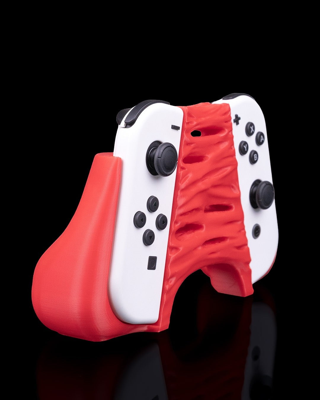 MJR Crafted red monster dock cover and controller holder for Nintendo Switch and OLED.